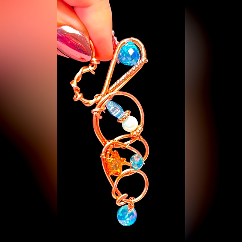 Unique abstract hammered copper pendant